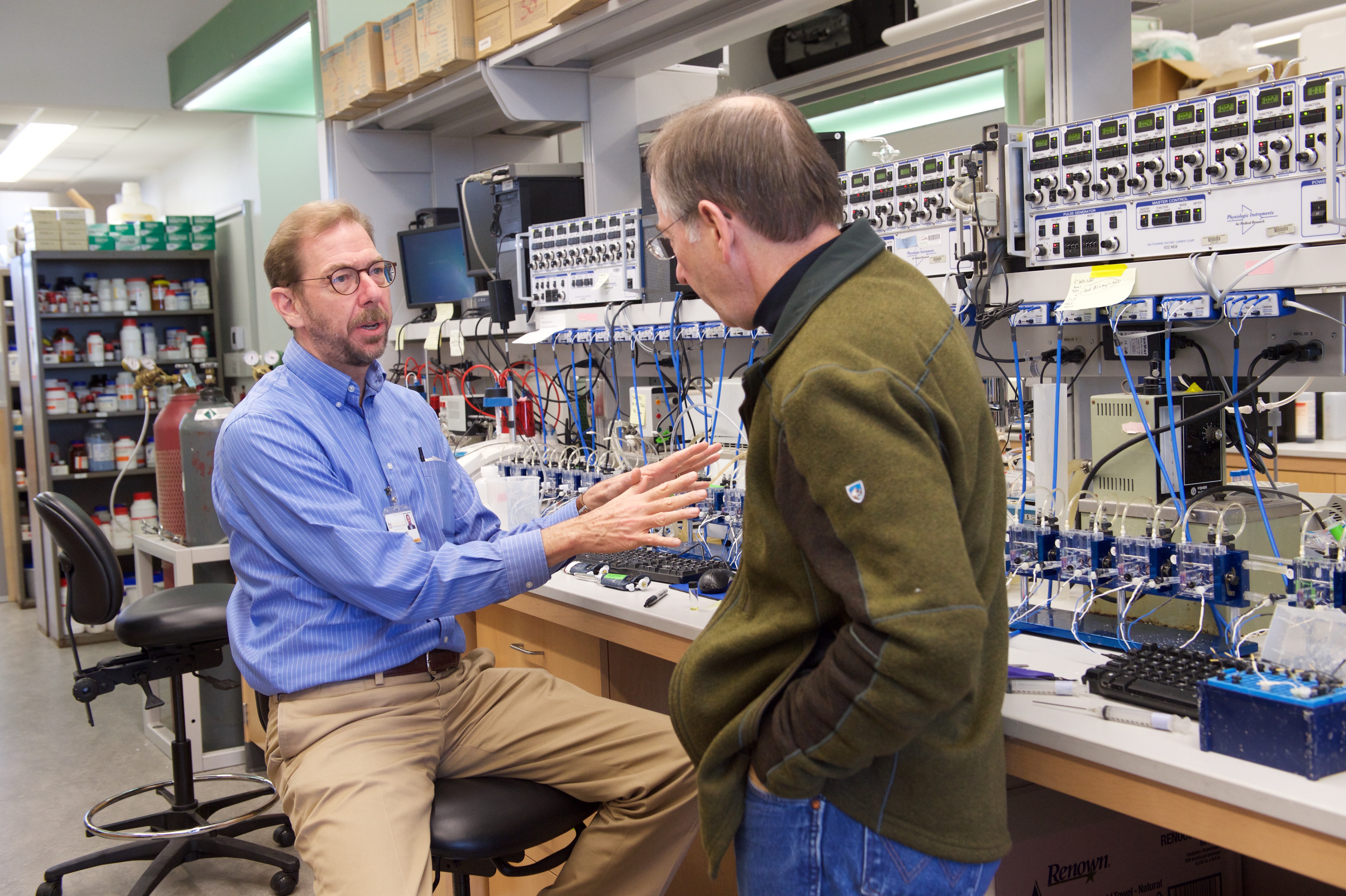 Paul McCray, MD (left), confers with colleague Michael Welsh, MD.