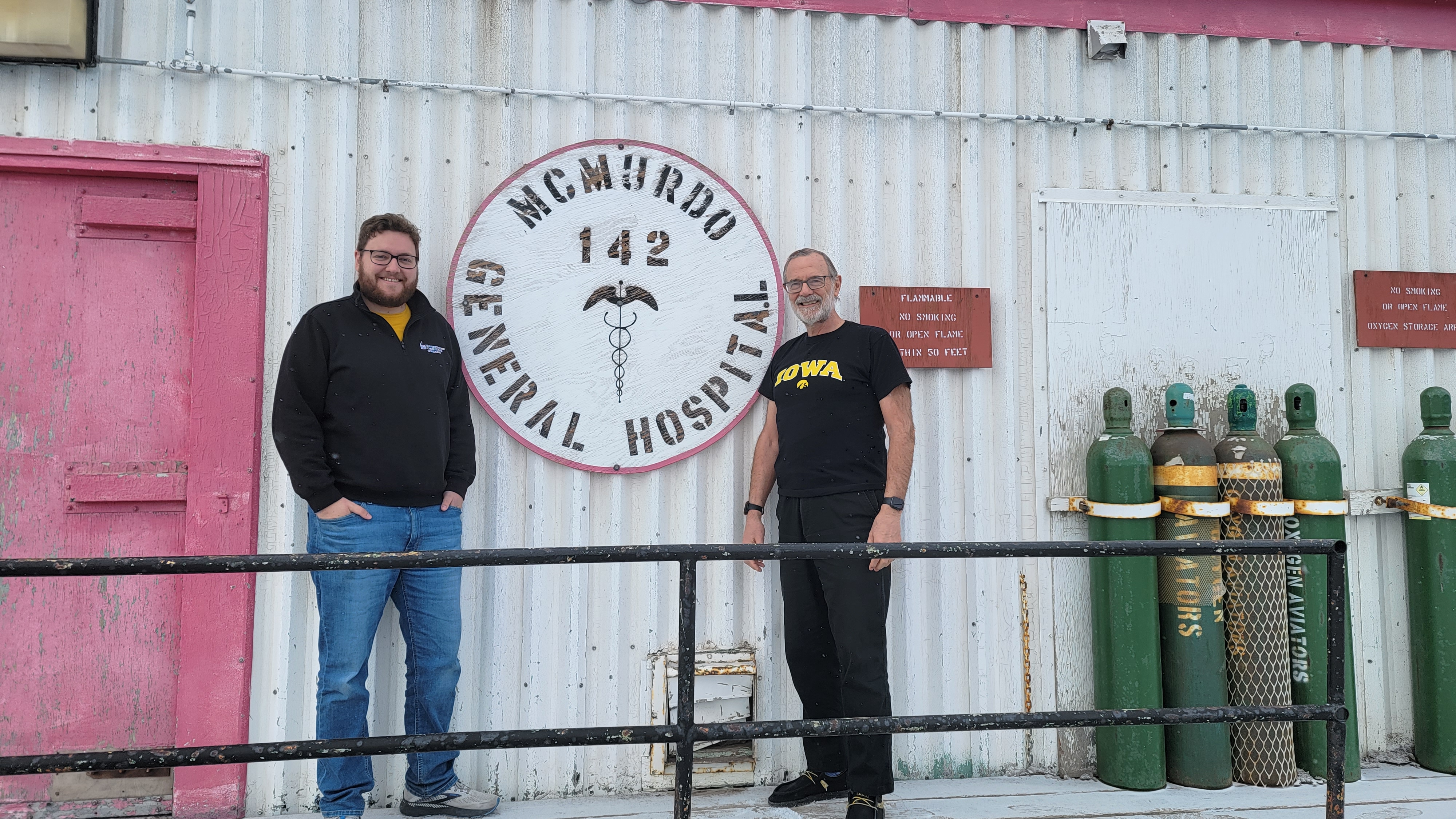Isaiah Reeves (20MD) and Jon Ahrendsen (82MD) are Iowa alumns who were  both were coincidentally stationed to serve the community of research scientists and support staff who come to McMurdo from across the globe.