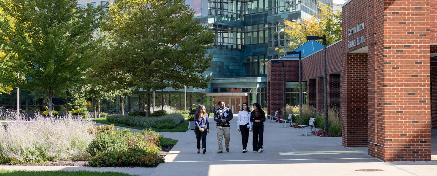 ICARE Post-Baccalaureate Fellows on the Carver College of Medicine campus on Tuesday, September 26, 2023. Pictured are: Kassandra Sanchez, Kim Serrano, Analy Phonephakdy, Koffi Amegble. The Holden Comprehensive Cancer Center has launched the ICARE Post-Baccalaureate Fellows Program in partnership with the American Cancer Society for recent graduates who are considering graduate school and a career in cancer research.