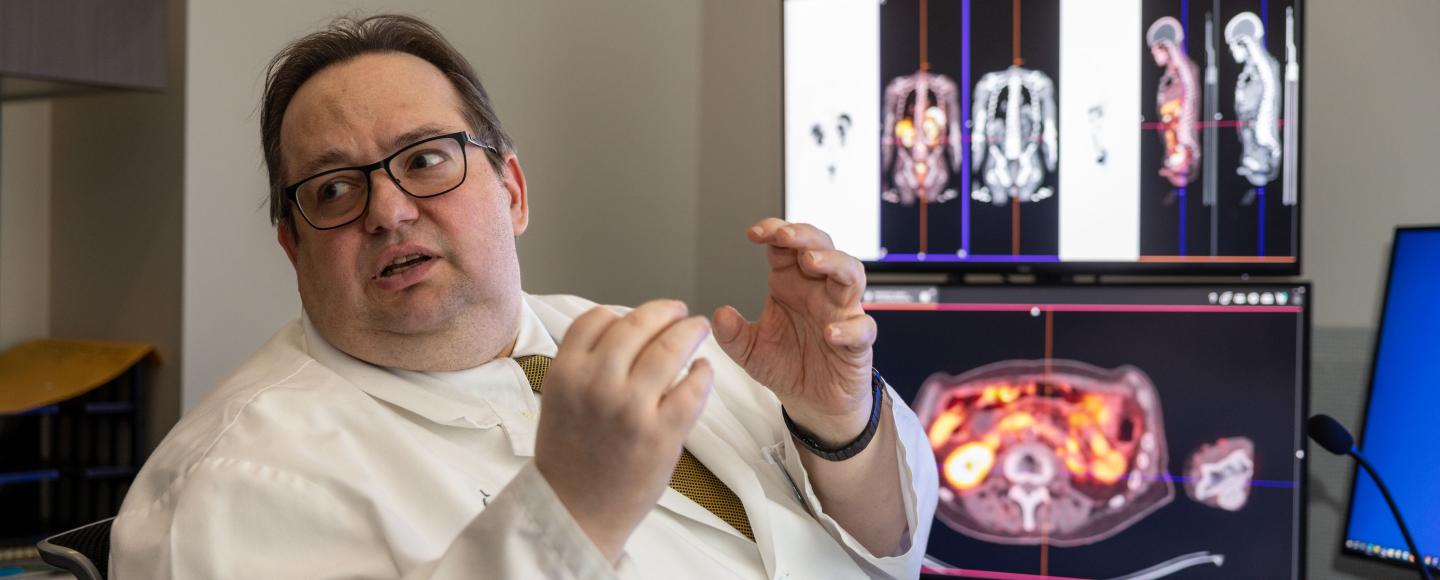 Dr. Yusuf Menda in the Nuclear Medicine clinic on Monday, Feb. 26, 2024. Menda is a professor in the UI Department of Radiology and its Division of Nuclear Medicine working on clinical trials of theranostics, which allows physicians to see and target specific receptors on cancerous cells, minimizing the impact on surrounding healthy tissue.