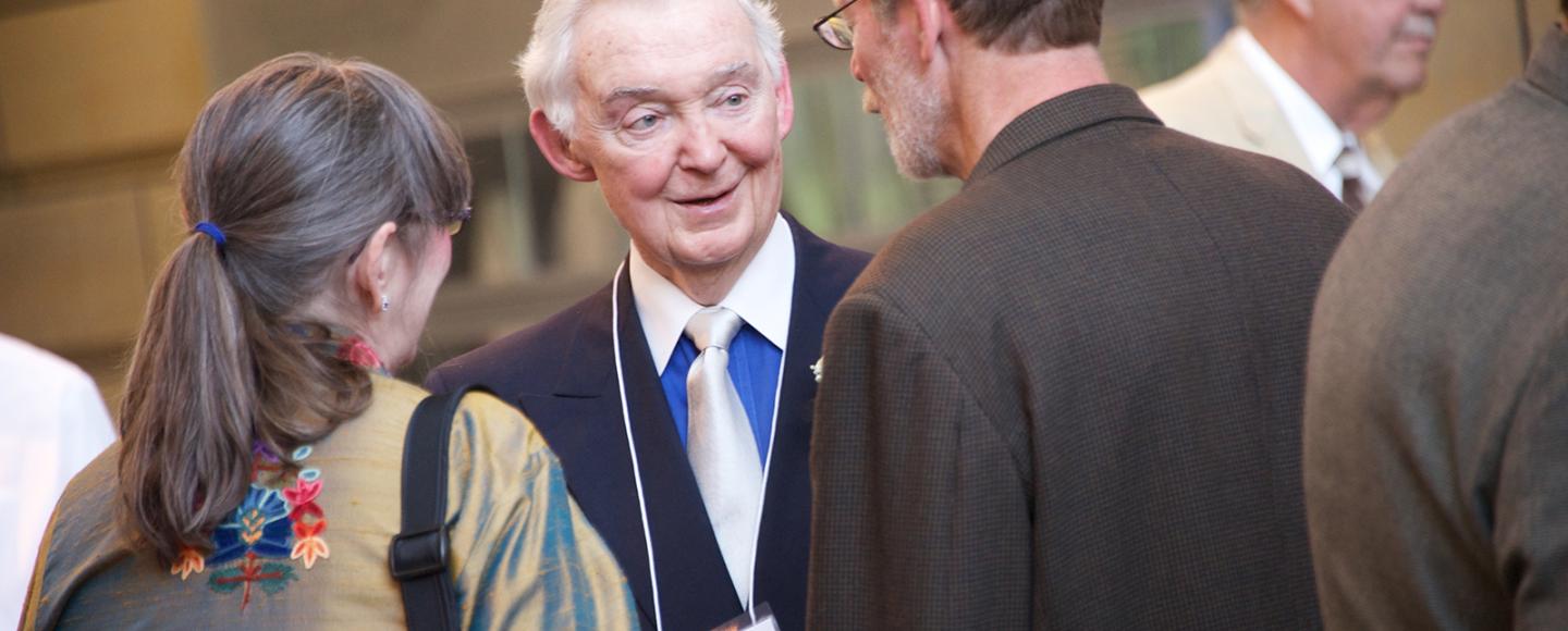 Dr. John Colloton talking in group