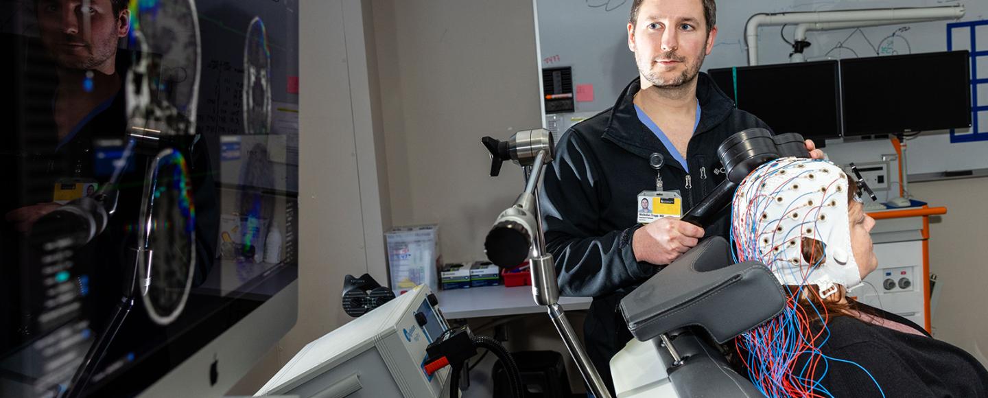 Nicholas Trapp, MD in his lab with simulated patient