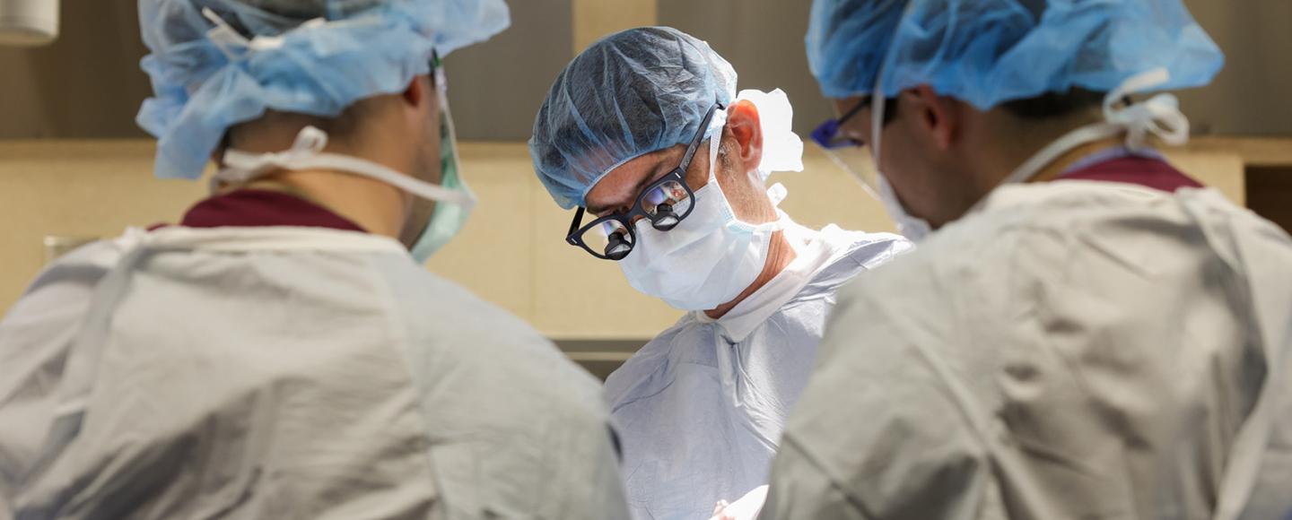 Benjamin Miller, MD, MS performing surgery