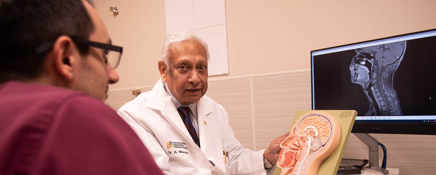 Dr. Menezes with patient