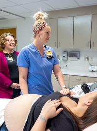 OBGYN Greiner and monographer doing ultrasound