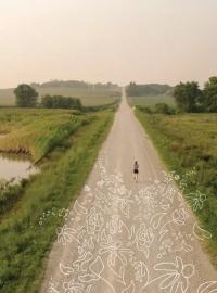 Grace Lidgett runs through rural Tama County on Thursday, July 31, 2025. Grace was diagnosed with cystic fibrosis as an infant, and through therapies that included Ofkambi and now Trikafta, has been able to live an active life that included running on her high school track and cross country teams.