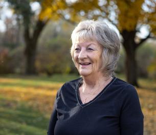 Sharon Chamberlin smiling outside.