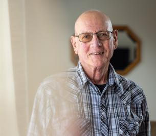 Ron Muhlenbruck in his home