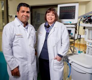 two doctors standing in a hospital room