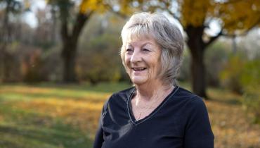 Sharon Chamberlin smiling outside.