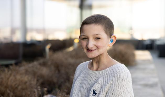 Bella Saul was originally diagnosed with rhabdomyosarcoma as a young child and was treated with chemotherapy and radiation. But, in 2022, UI doctors biopsied a new mass in her mouth and diagnosed osteosarcoma, or cancer of the bone.