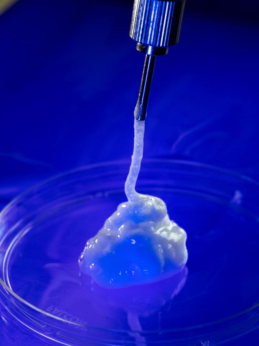 Foam being ejected onto a petri dish