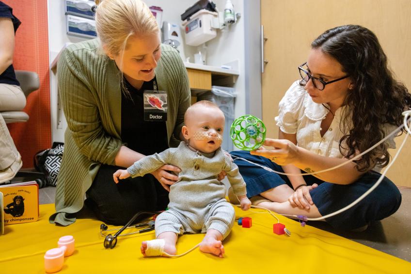 Amy H. Stanford MD, and neonatal-perinatal fellow Jenna Geick, MD, in the NICU followup clinic, evaluate Nash Keen at University of Iowa Health Care Stead Family Children’s Hospital Pediatric Specialty Clinic on Wednesday, June 4, 2025. Nash was born in July 2024 as the earliest baby ever born at 21 weeks, 0 days gestation. He has survived with very minimal complications and is home and thriving.