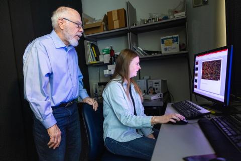 Kevin Campbell mentoring student in Lab