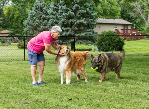 Tammy Whitmer continues to use TENS in combination with physical therapy to help reduce pain associated with fibromyalgia, allowing her to enjoy gardening and playing with her dogs, Bentley and Samson