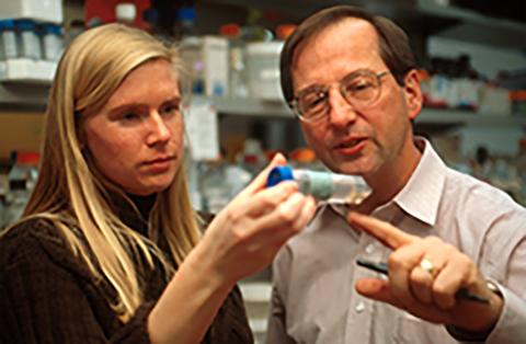 Mike Welsh in lab with student